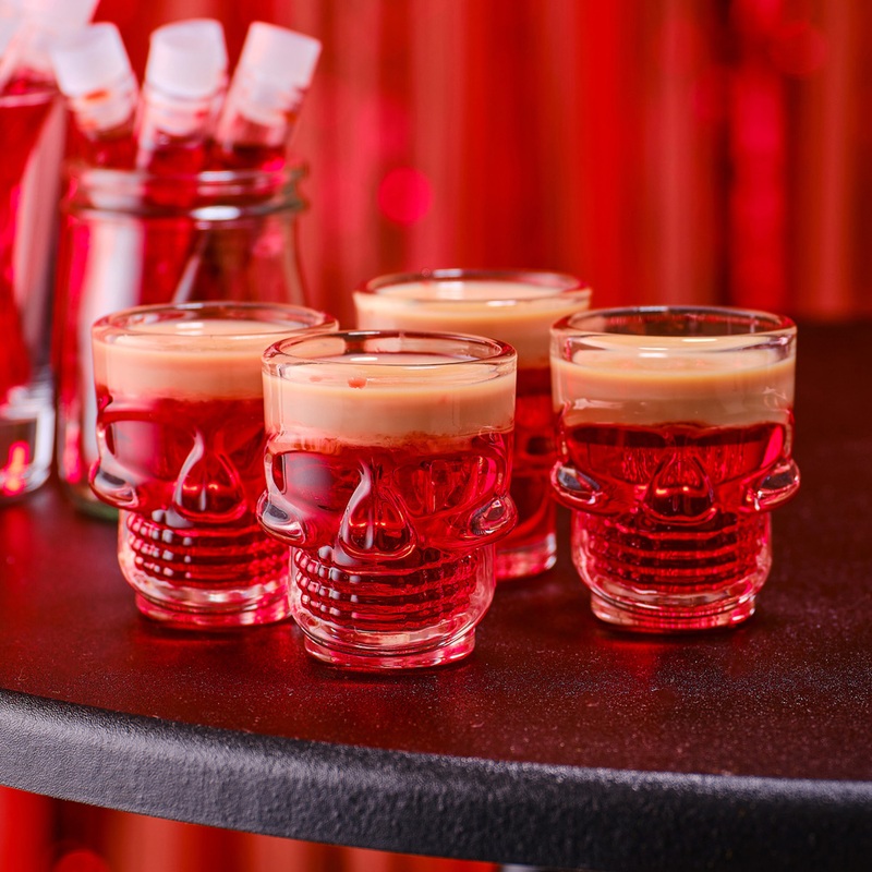 4 skull shot glasses 7cm