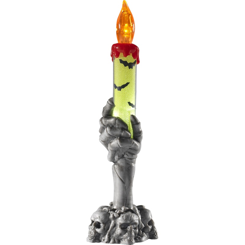 Glowing scary decorative candle