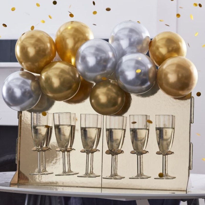 Golden champagne wall with balloons