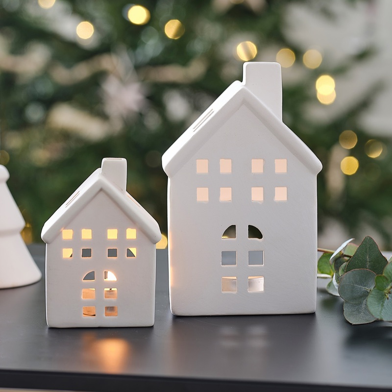 2 white ceramic houses tea light holders